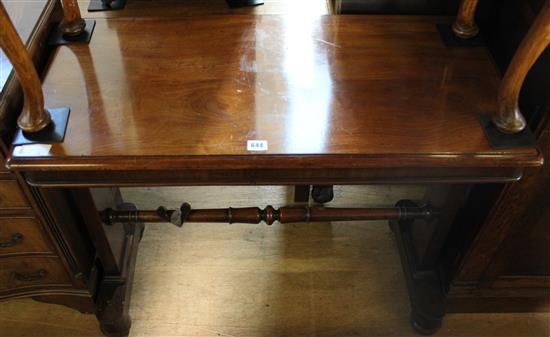 19th century mahogany rectangular stretcher table with trestle end supports(-)